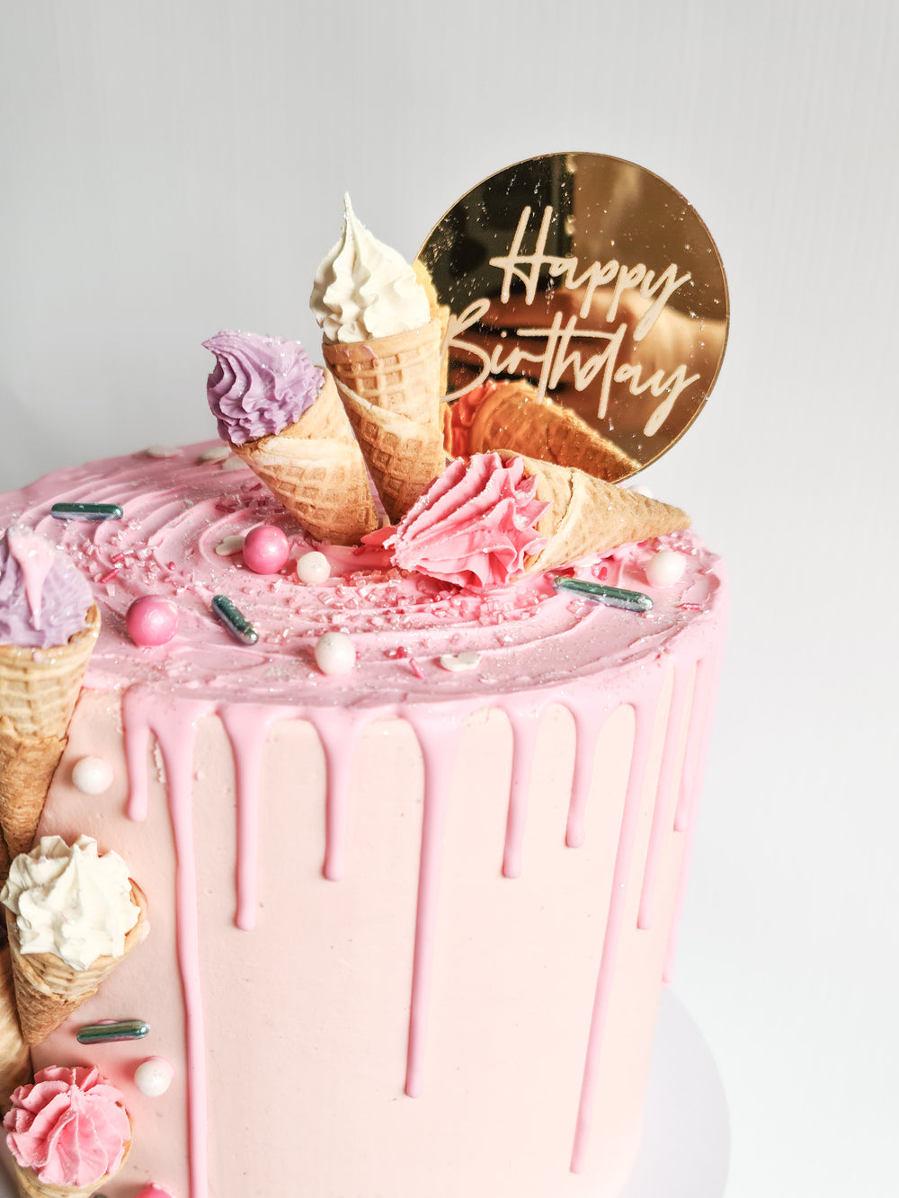 Pink mini ice cream drip birthday celebration cake Isle of Man