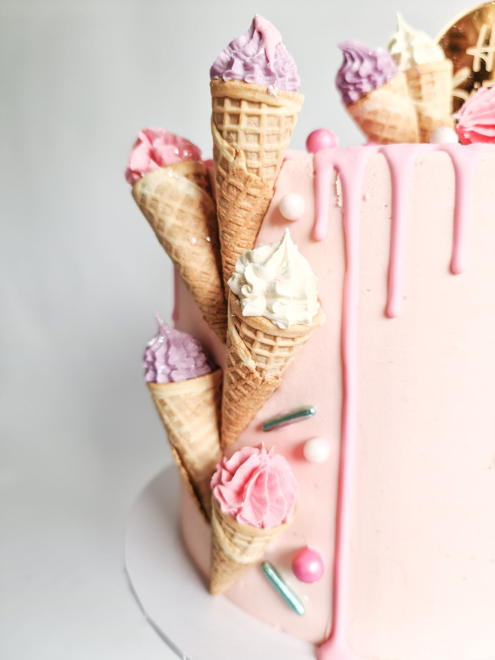 Pink mini ice cream drip birthday celebration cake Isle of Man