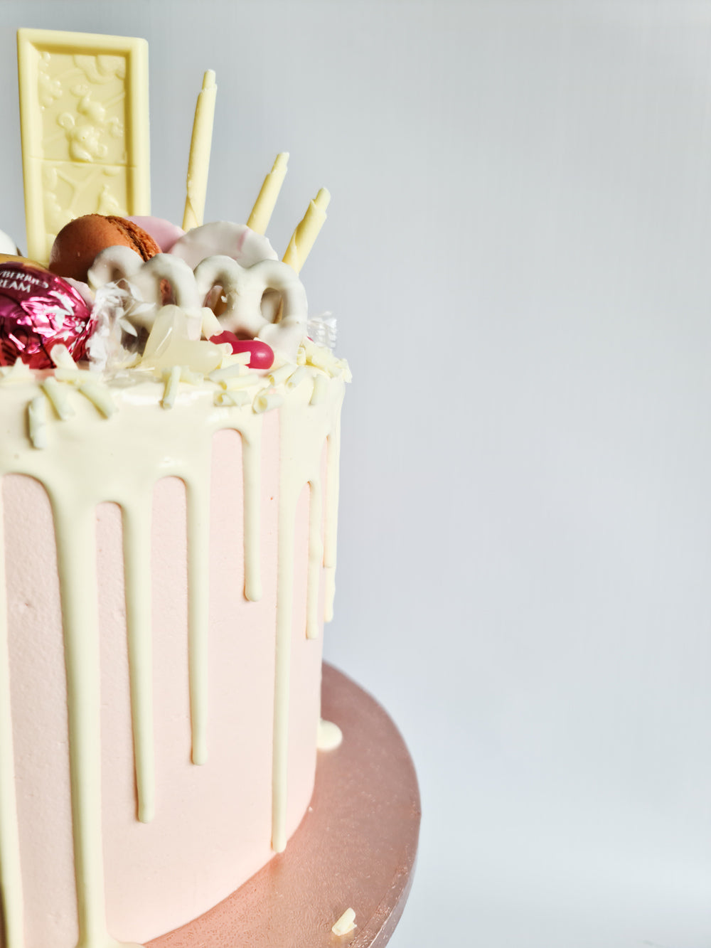Pink fully loaded drip birthday celebration cake Isle of Man