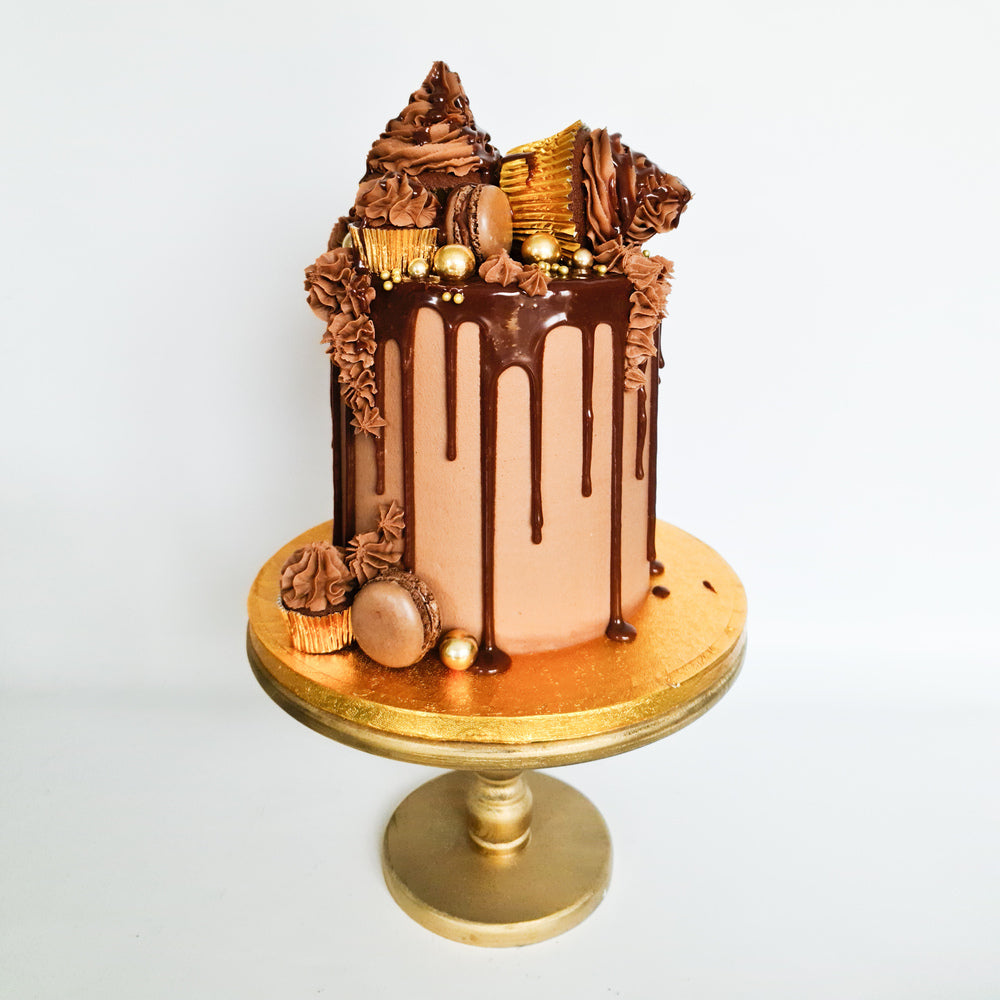 Chocolate cupcakes and macaron drip birthday celebration cake Isle of Man