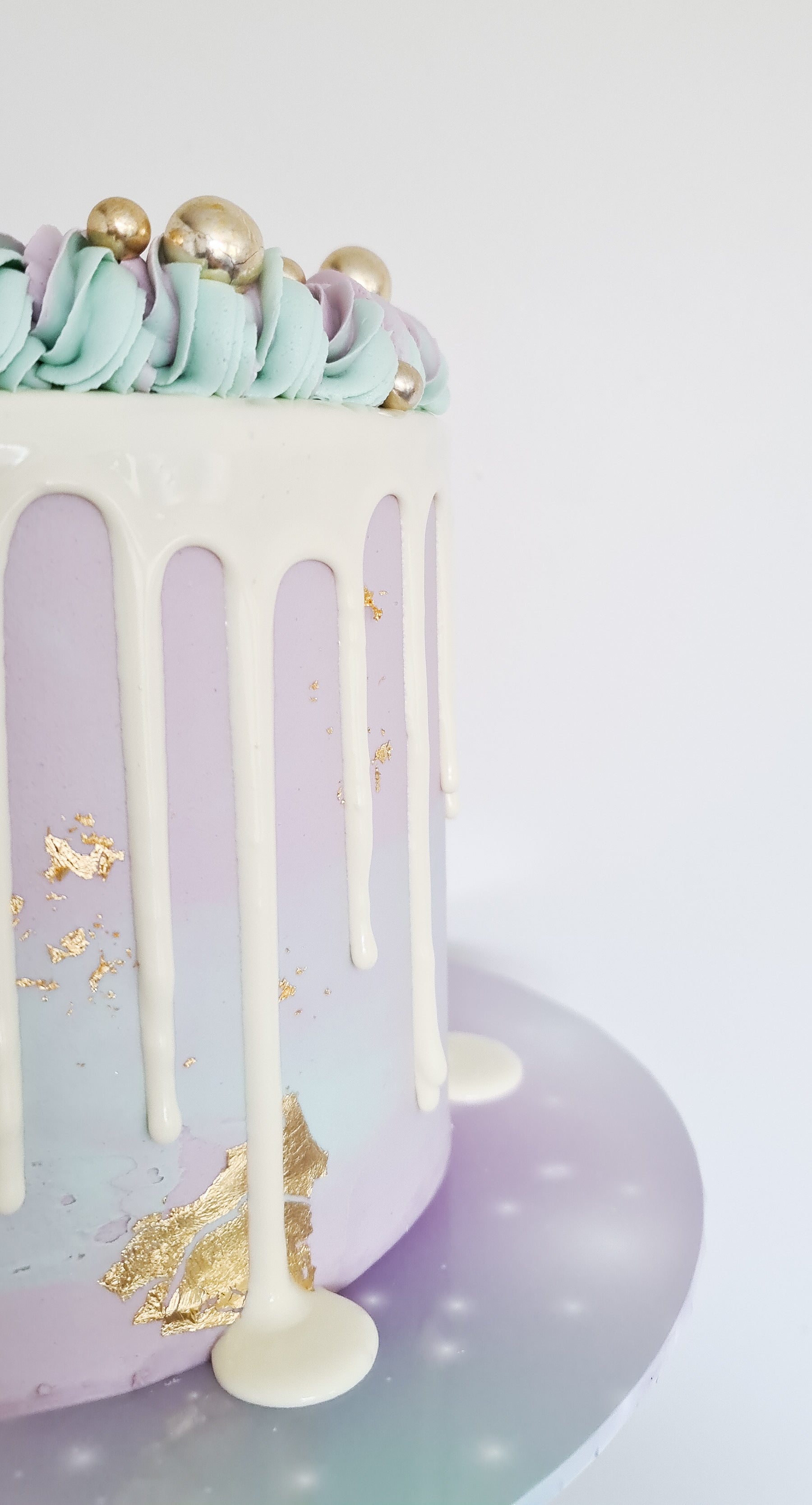 Lilac and blue galaxy cake