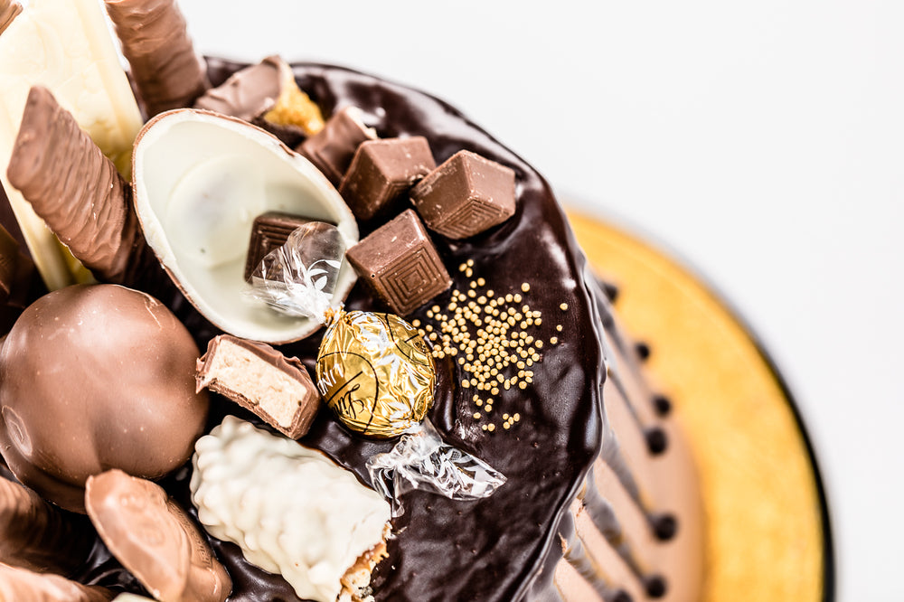 Chocolate fully loaded drip cake for birthday celebration Isle of Man